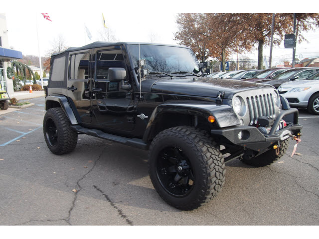 Pre-Owned 2014 Jeep Wrangler Unlimited Oscar Mike 4x4 Sport 4dr SUV in ...