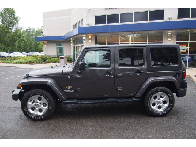 Pre-Owned 2014 Jeep Wrangler Unlimited Sahara w/Nav 4x4 Sahara 4dr SUV ...